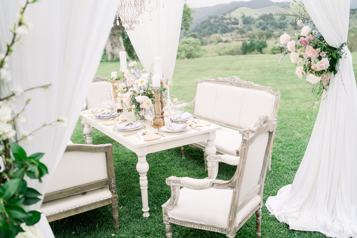 Reception table at Sunstone Winery wedding in Santa Ynez, CA