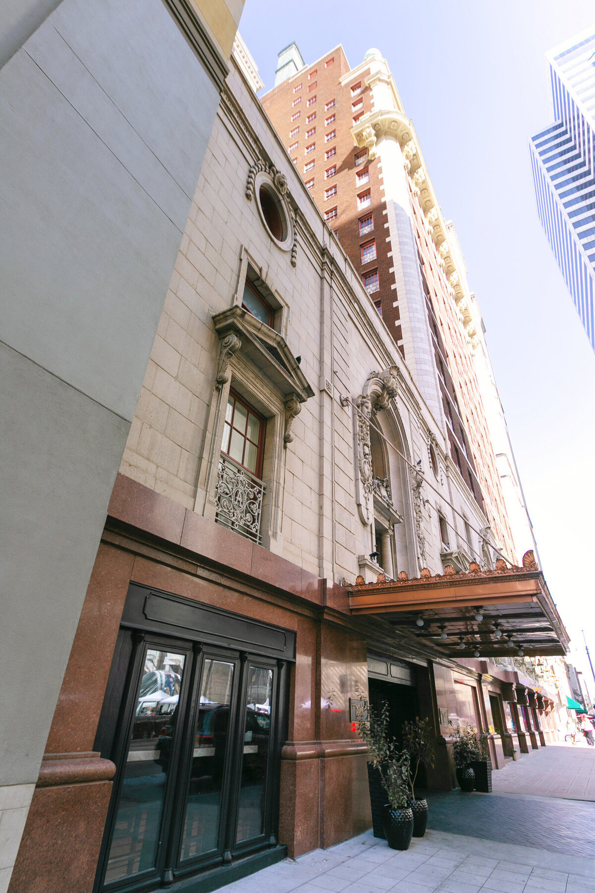 exterior view of The Adolphus hotel in Dallas, highlighting the historic and iconic venue for weddings and events in the city.