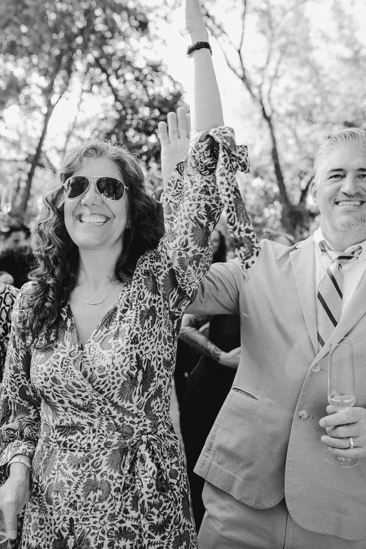 Wedding guests at outdoor wedding ceremony at Umlauf Sculpture Garden, Austin