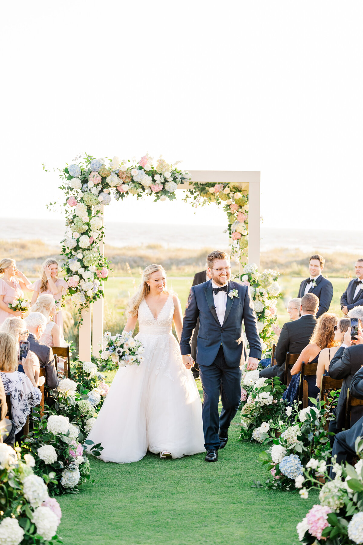 bride and groom at their ocean course on kiawah island wedding