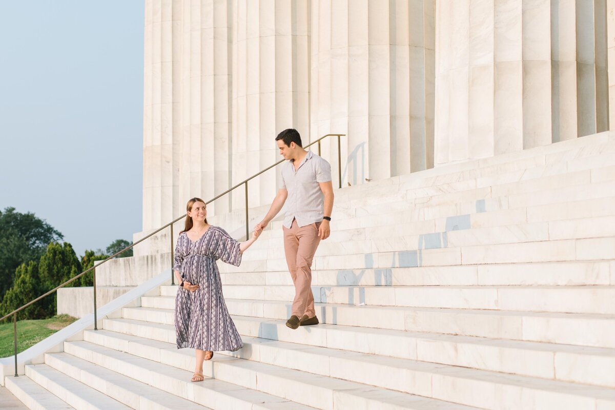 maternity photo session walking on lincoln memorial steps