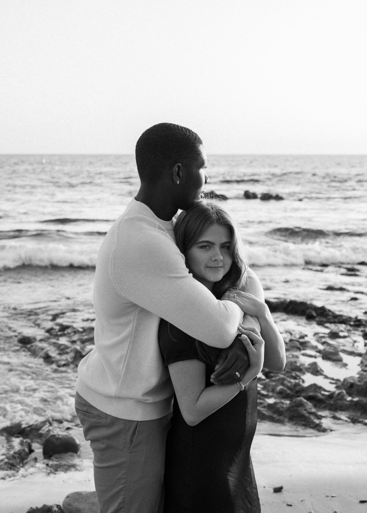 moody couples photo on the beach