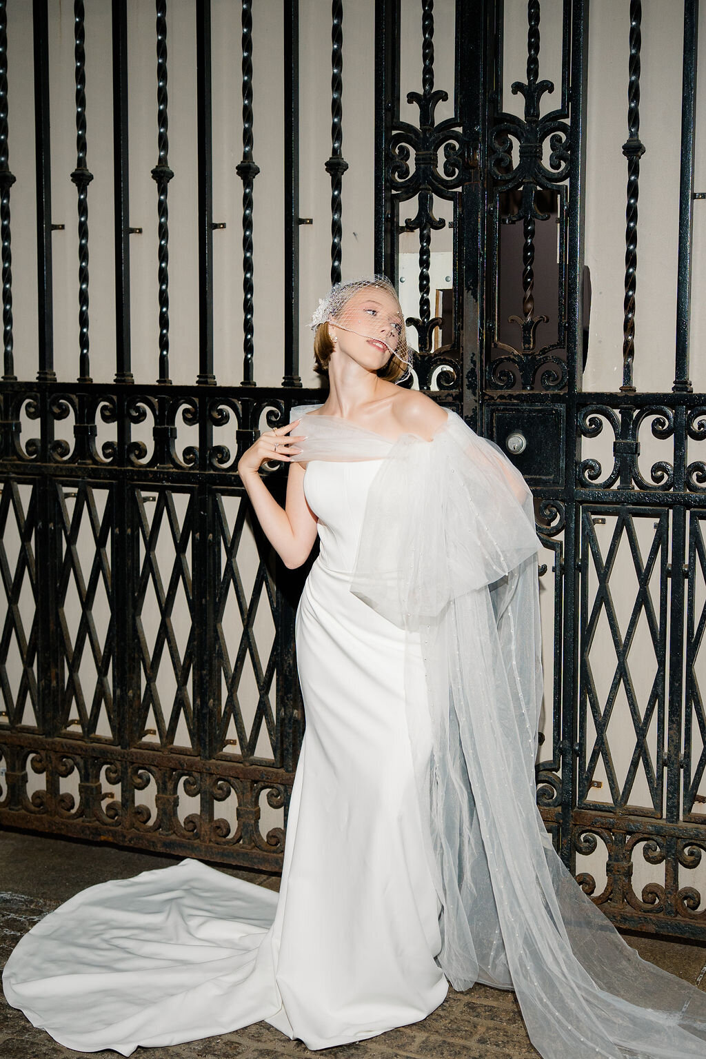Handmade cathedral length bridal scarf featuring soft tulle and scattered pearls
