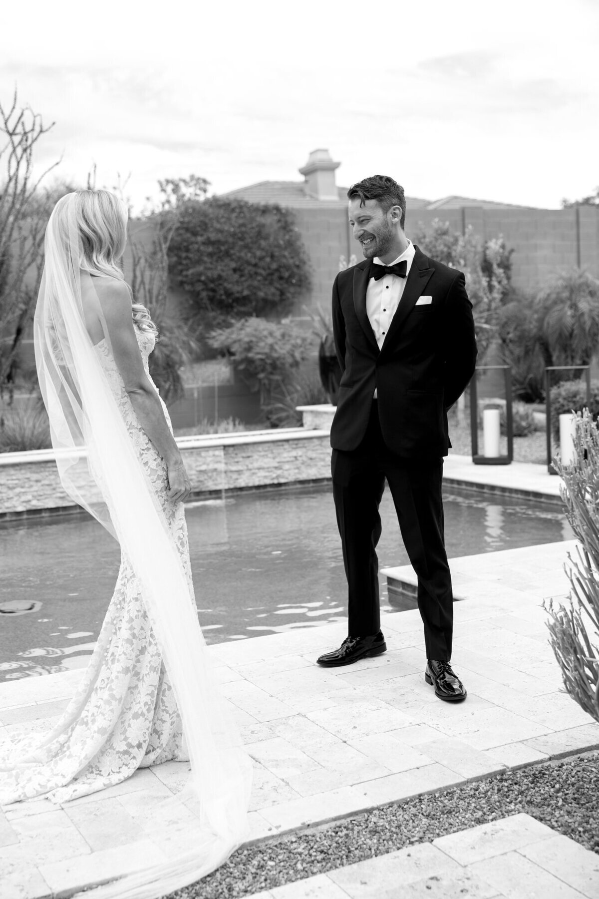 Groom seeing bride during first look in Scottsdale, Arizona
