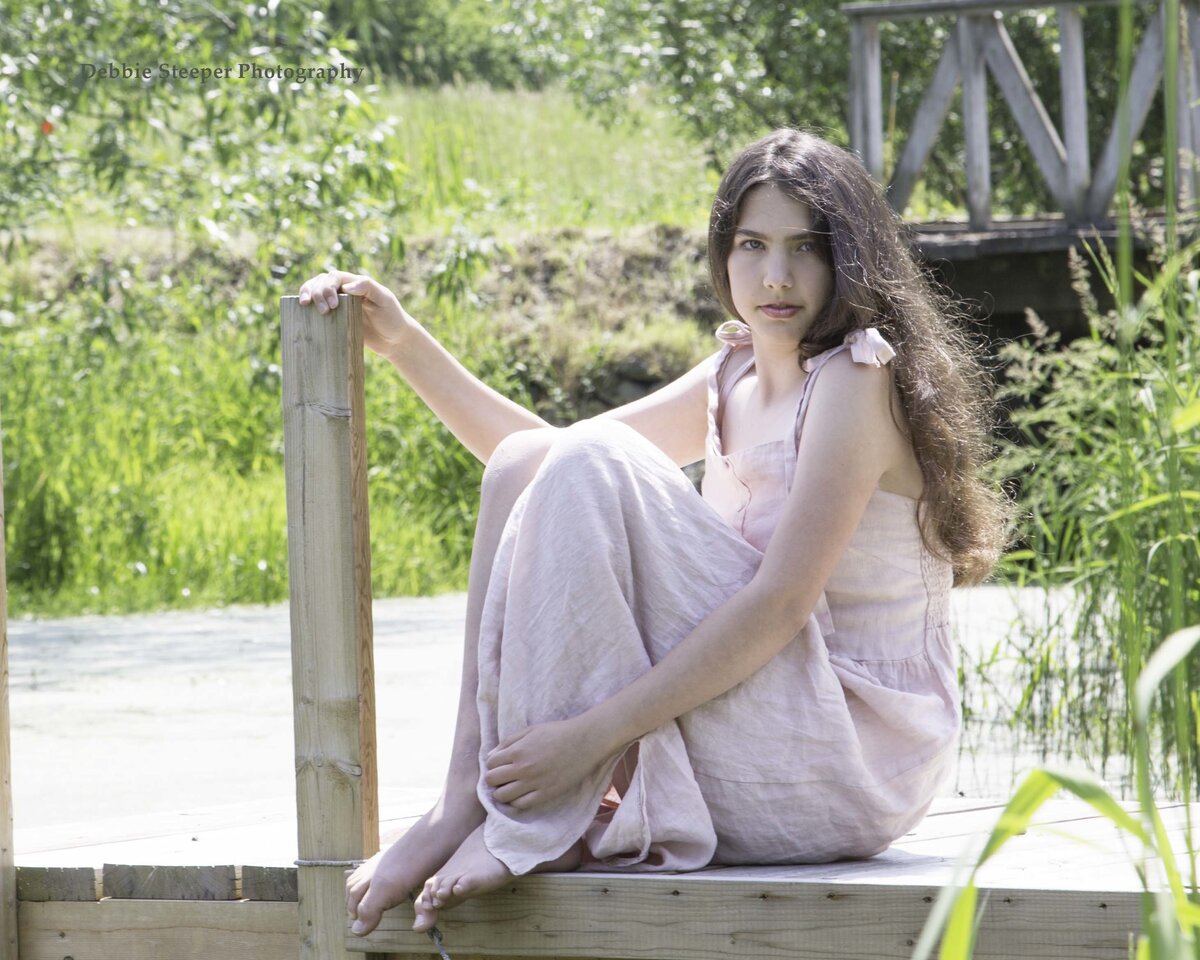 sitting-on-the-dock-photoshoot-teen-pink dress-girl-beauty-debbie-steeper-photography