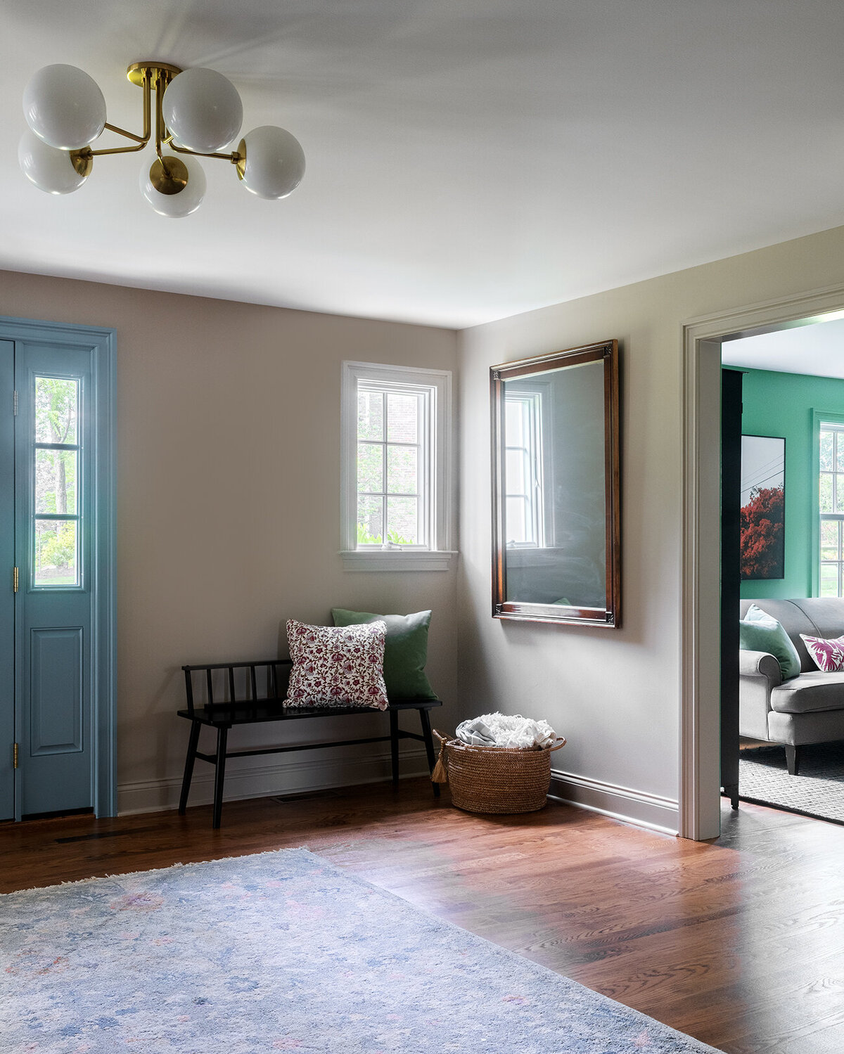 foyer seating area with large mirror