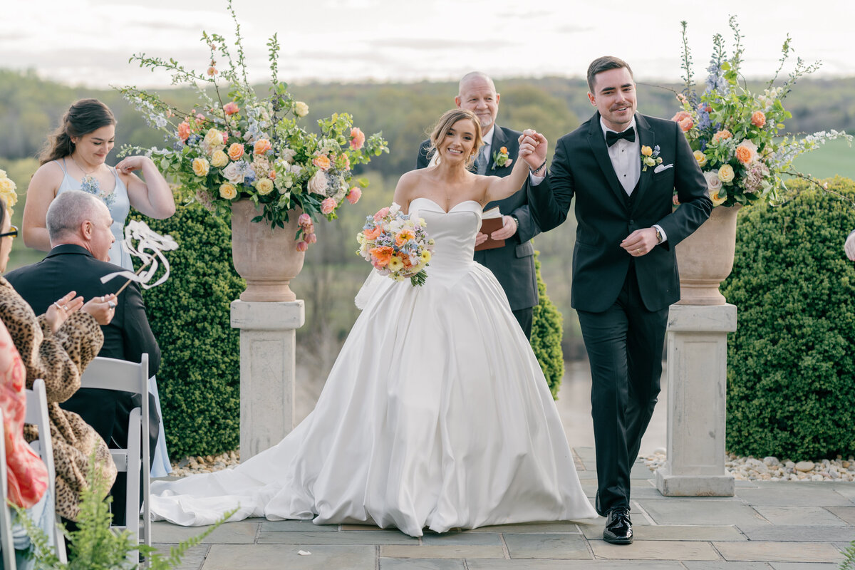 Estate at River Run Wedding in Maidens, VA | Wedding Photographer in Richmond | bride and groom recessing after their Bluestone Terrace Estate at River Run wedding in Richmond VA