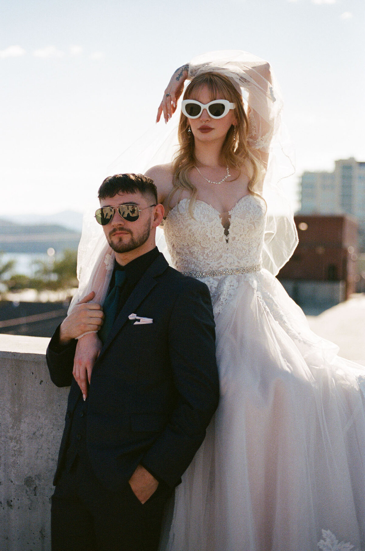Wedding couples portraits on a rooftop in film