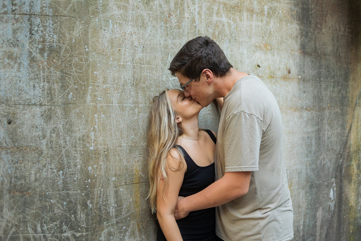 Passionate 'Kiss Me Anytime You Want' engagement photo captured by Style & Grace Photography in St. Louis, MO, showcasing the couple’s deep love and affection in a timeless moment.