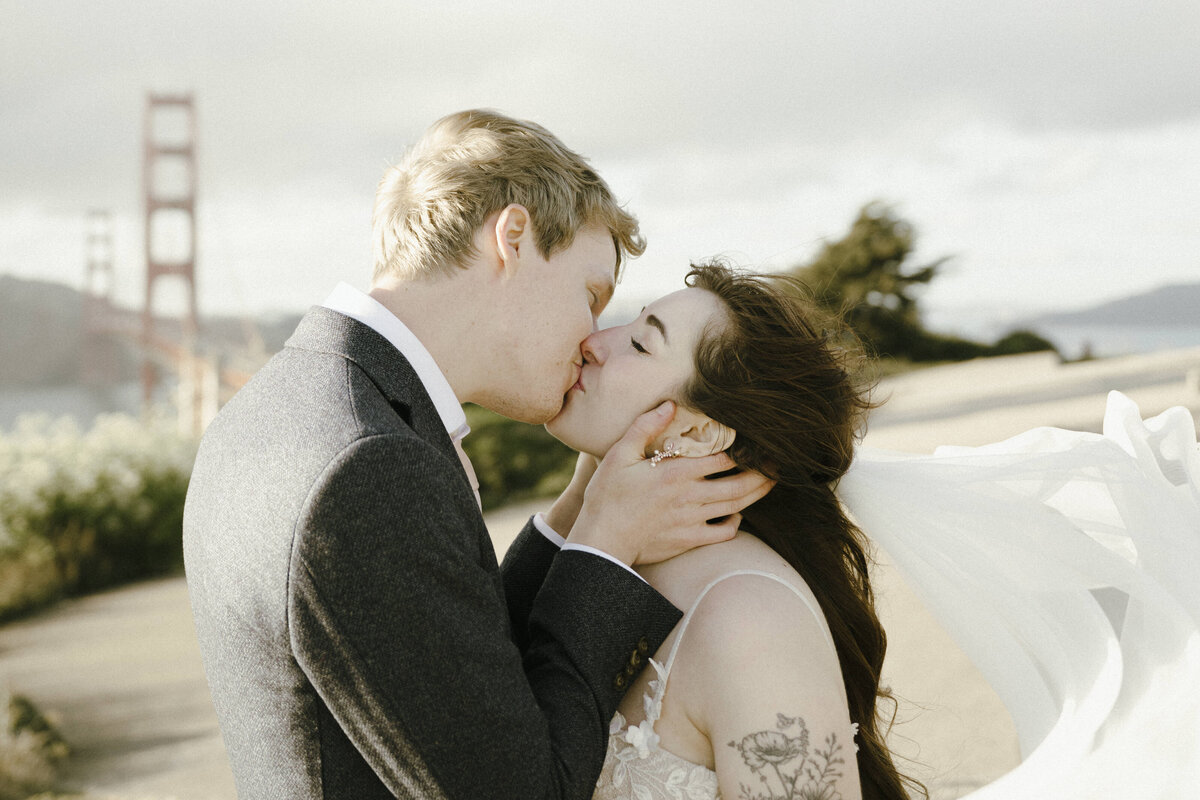 Bride and Groom at Marshall's Beach in San Francisco, California at sunset