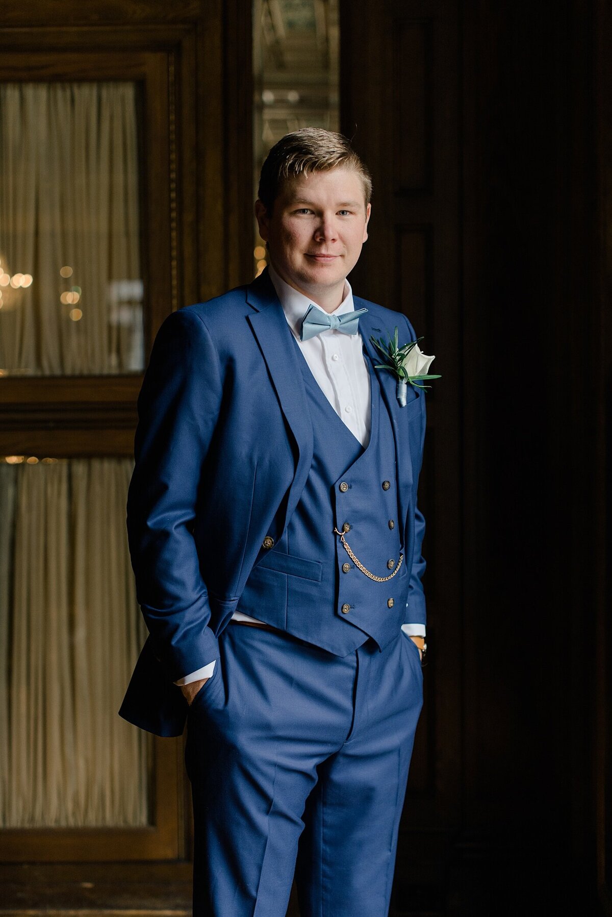 Groom posing in downtown Columbus taken by the best Ohio Wedding Photographer