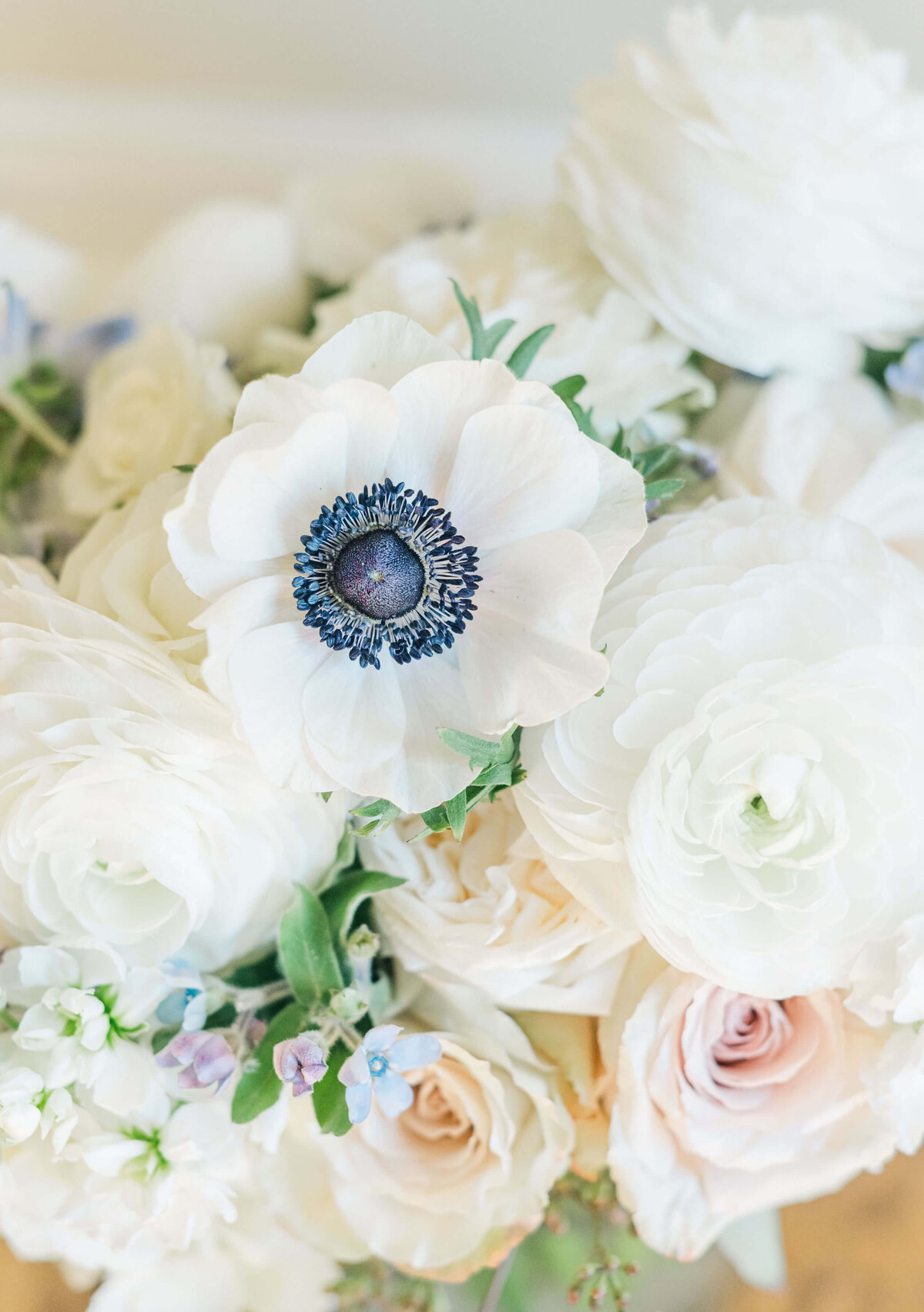 Wedding Bouquet Photographed by Katiera Lynn Photography Displaying pastel florals with a blue accent