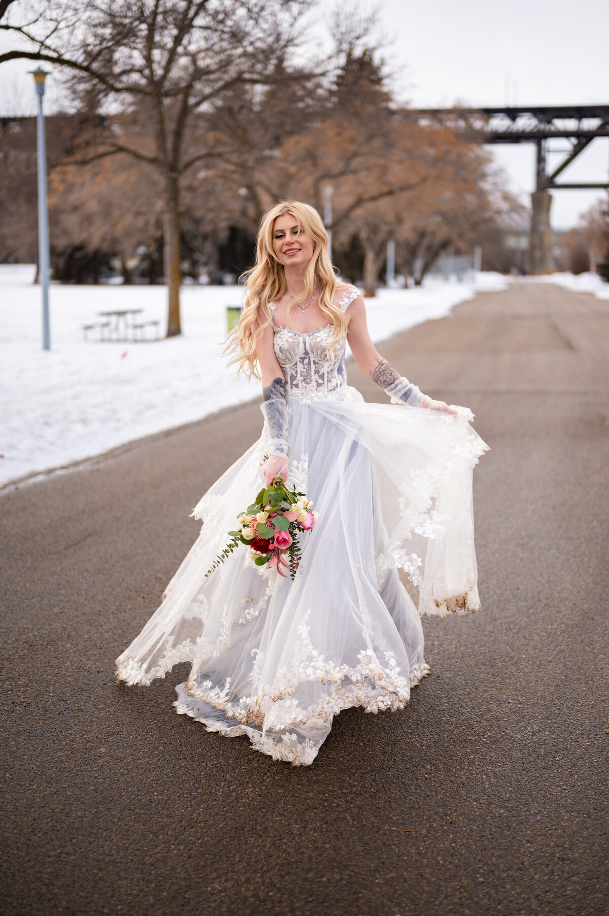 bride dancing and celebrating her wedding day