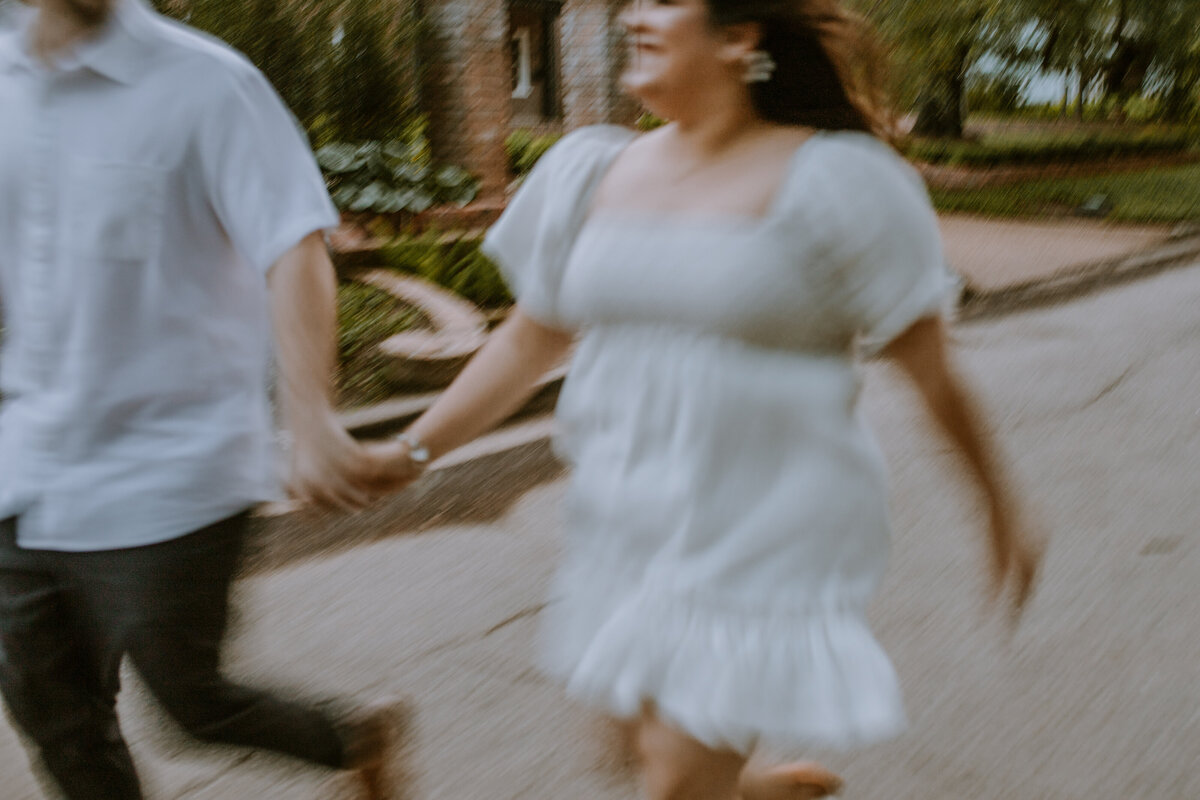 Roaming through the vibrant streets of Rice Village in Houston, Tx, I had the pleasure of capturing this couple's engagement photoshoot amidst the charming neighborhood backdrop. With its quaint shops and tree-lined sidewalks, every corner offered a picturesque setting for the couple to celebrate their love and excitement for their upcoming union.