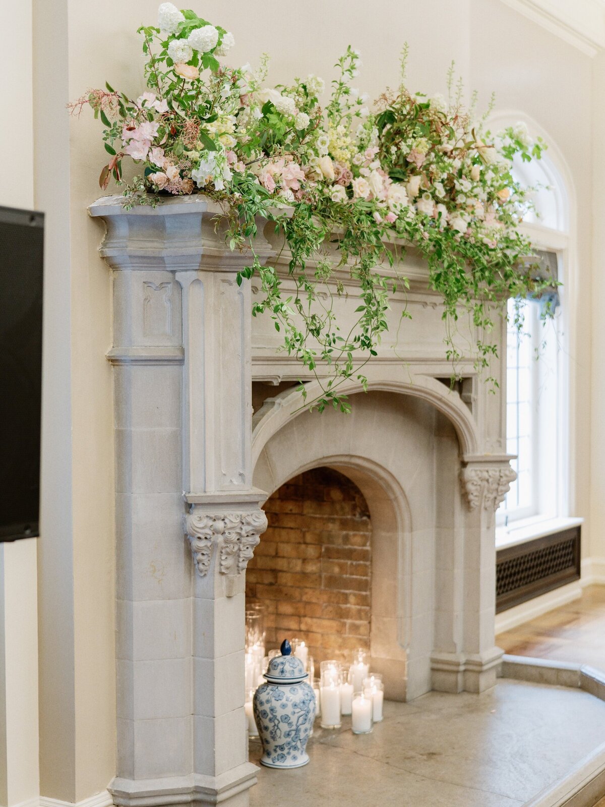 flowers on a fireplace mantel