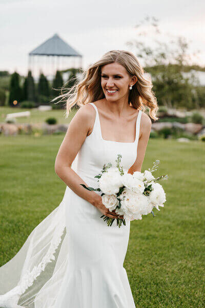 Bride holding bouquet by wedding planners in chicago