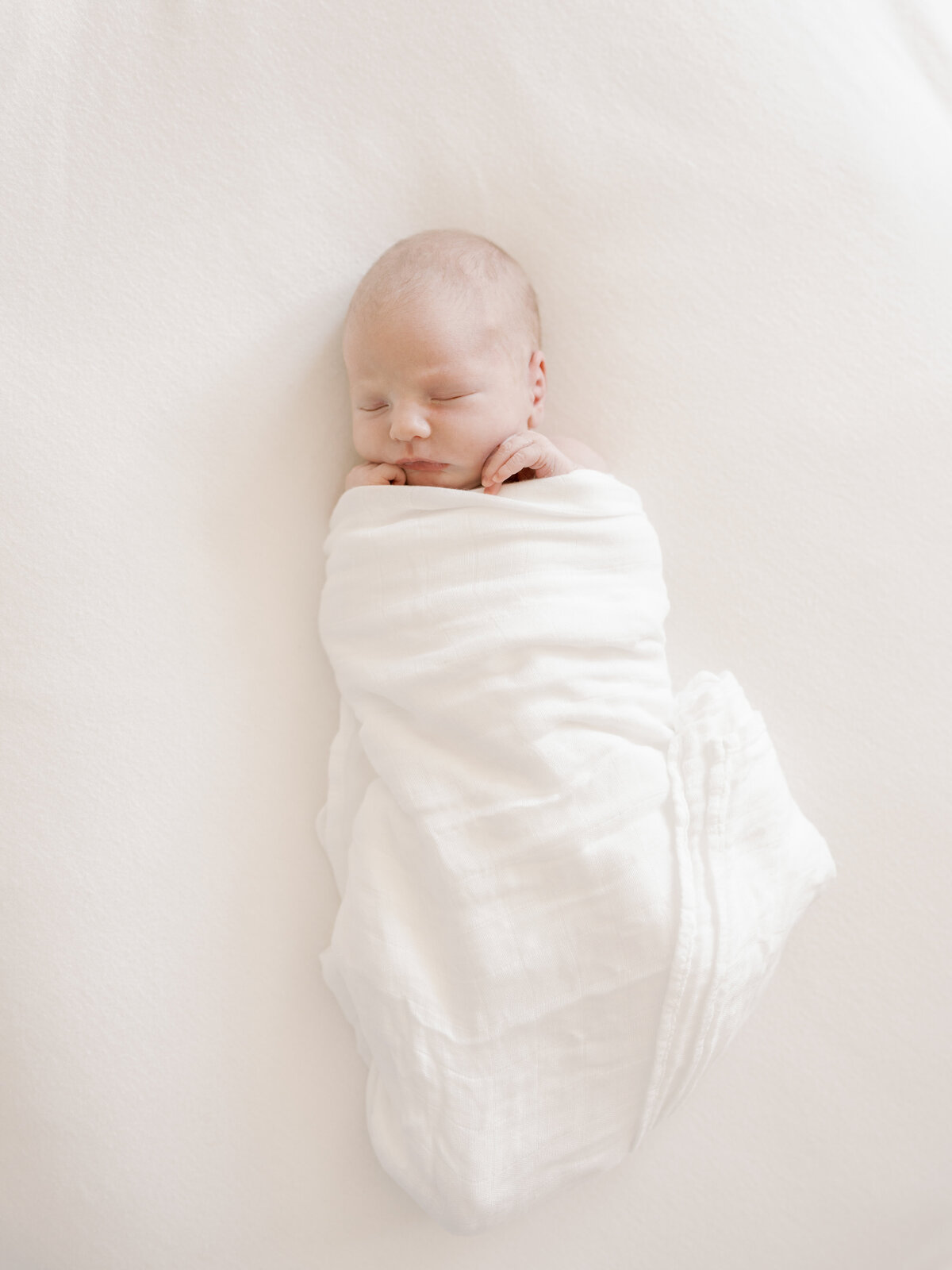 baby swaddled in a blanket