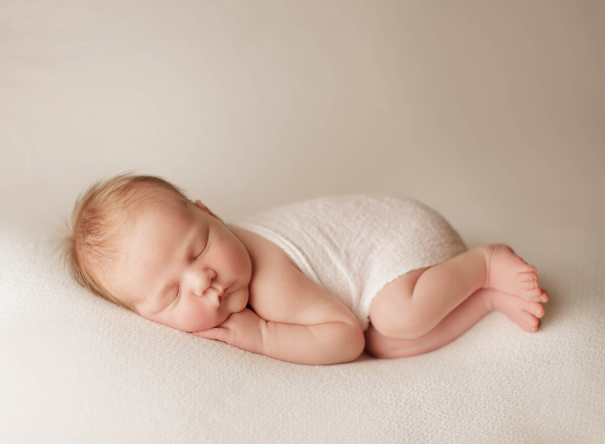 Newborn posed for Baby Photos in Charleston, SC.