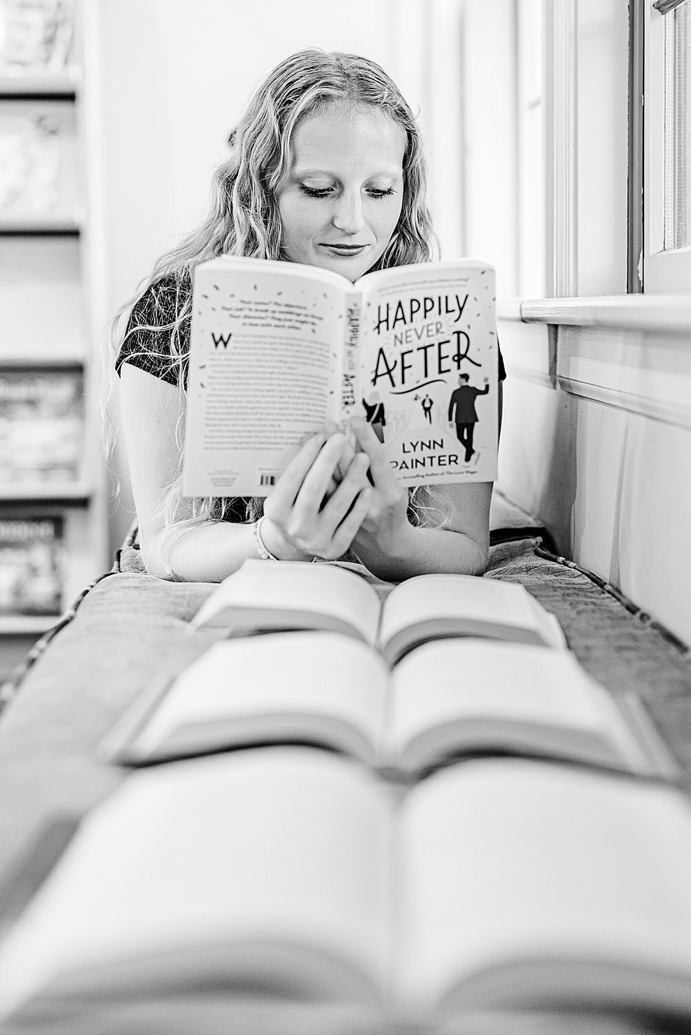 high-school-senior-reading-library-bench