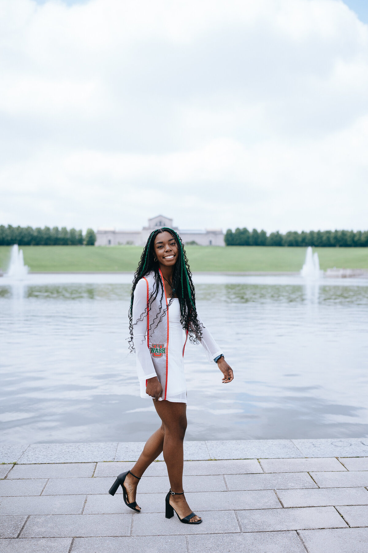 washu graduate walking by the grand basin