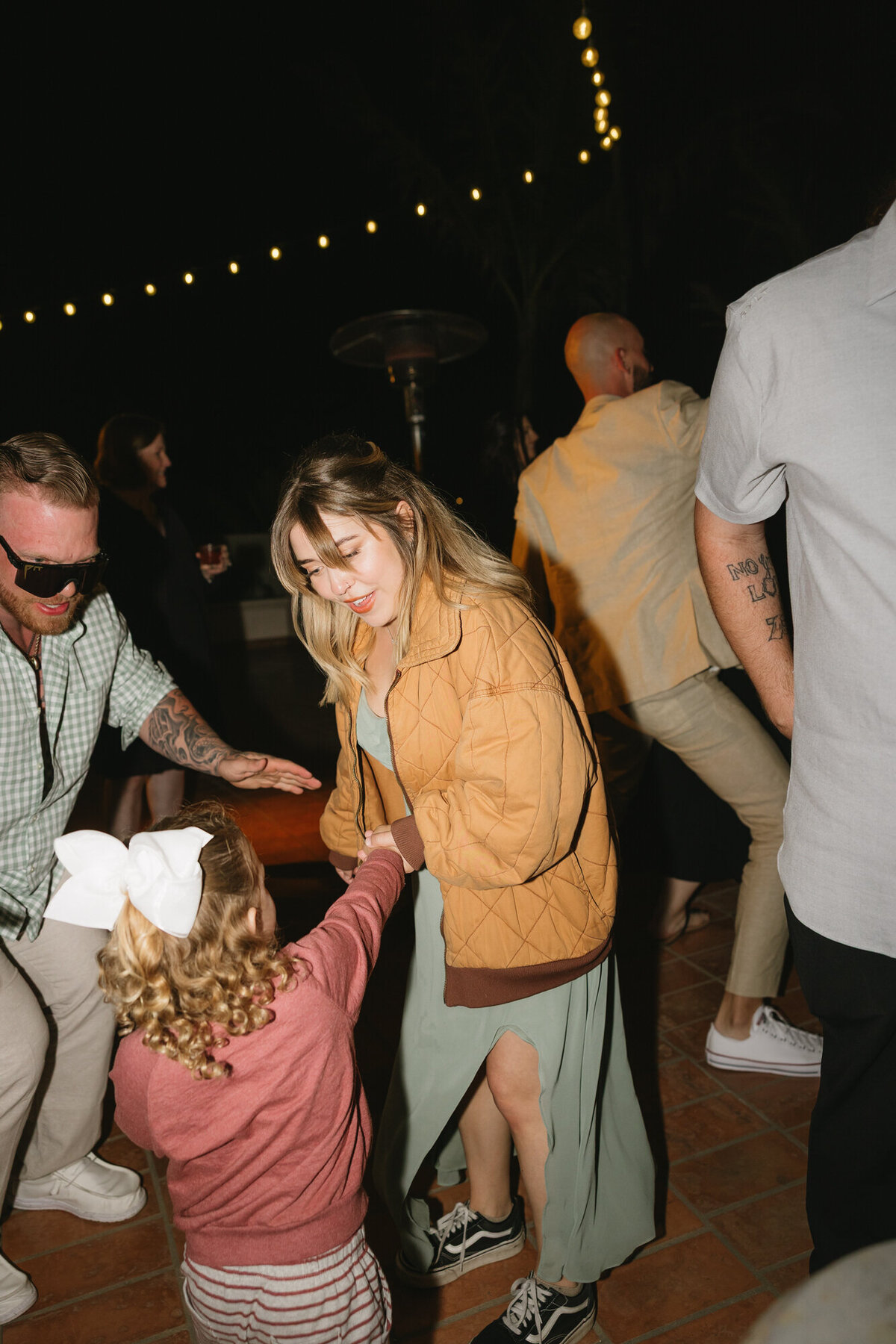 Guests dancing on dance floor at Hilton Beachfront Resort Santa Barbara