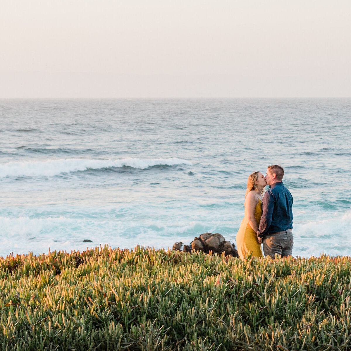 Sunset kiss along Scenic Drive in Pacific Grove