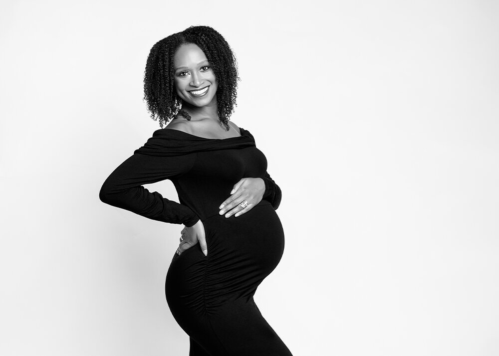 pregnant-black-woman-in-black-dress