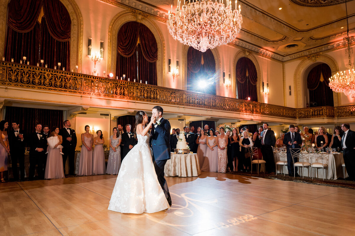 bride and groom dancing in beautiful wedding reception
