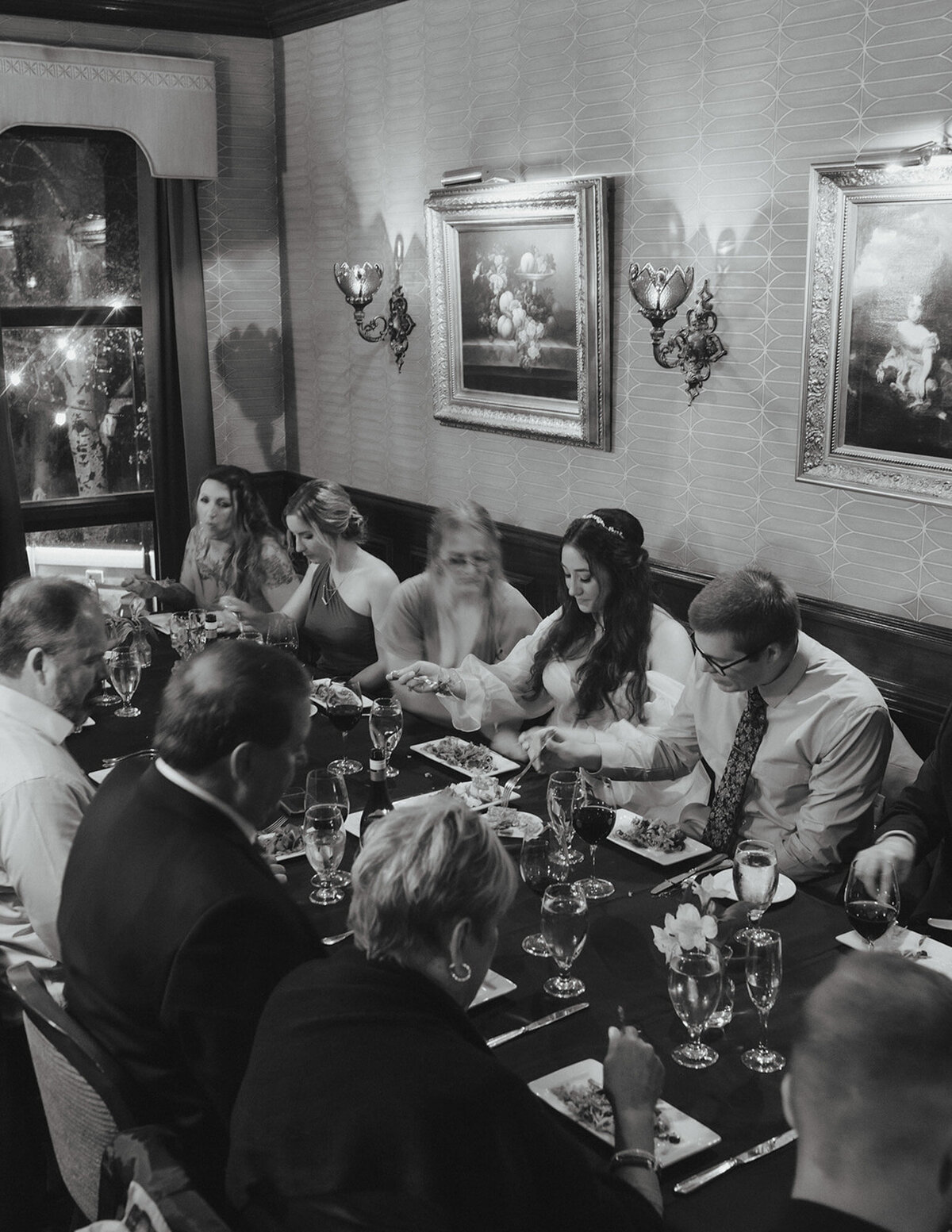 Cerise and Geoff's wedding reception in a black and white photo