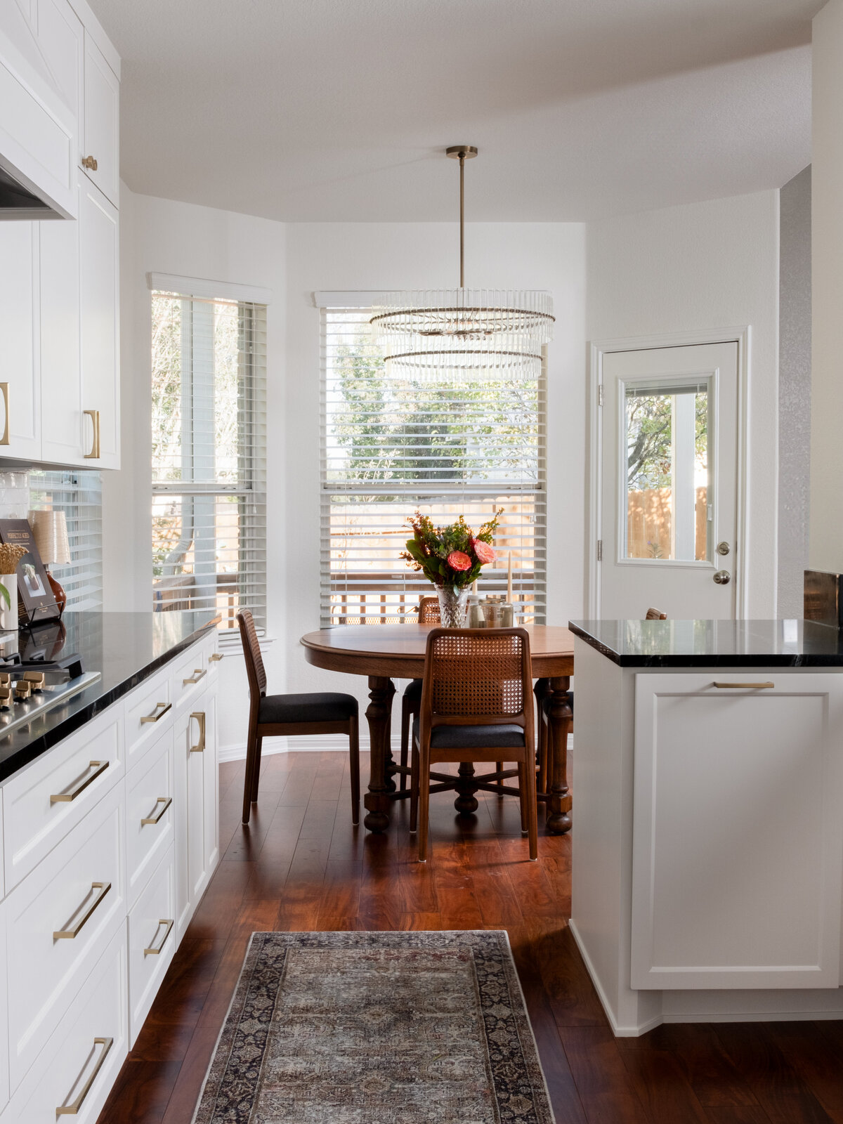 hello-home-austin-cream-kitchen-remodel-zellige-backsplash-contemporary-kitchen-vintage-breakfast-nook-soapstone-countertop