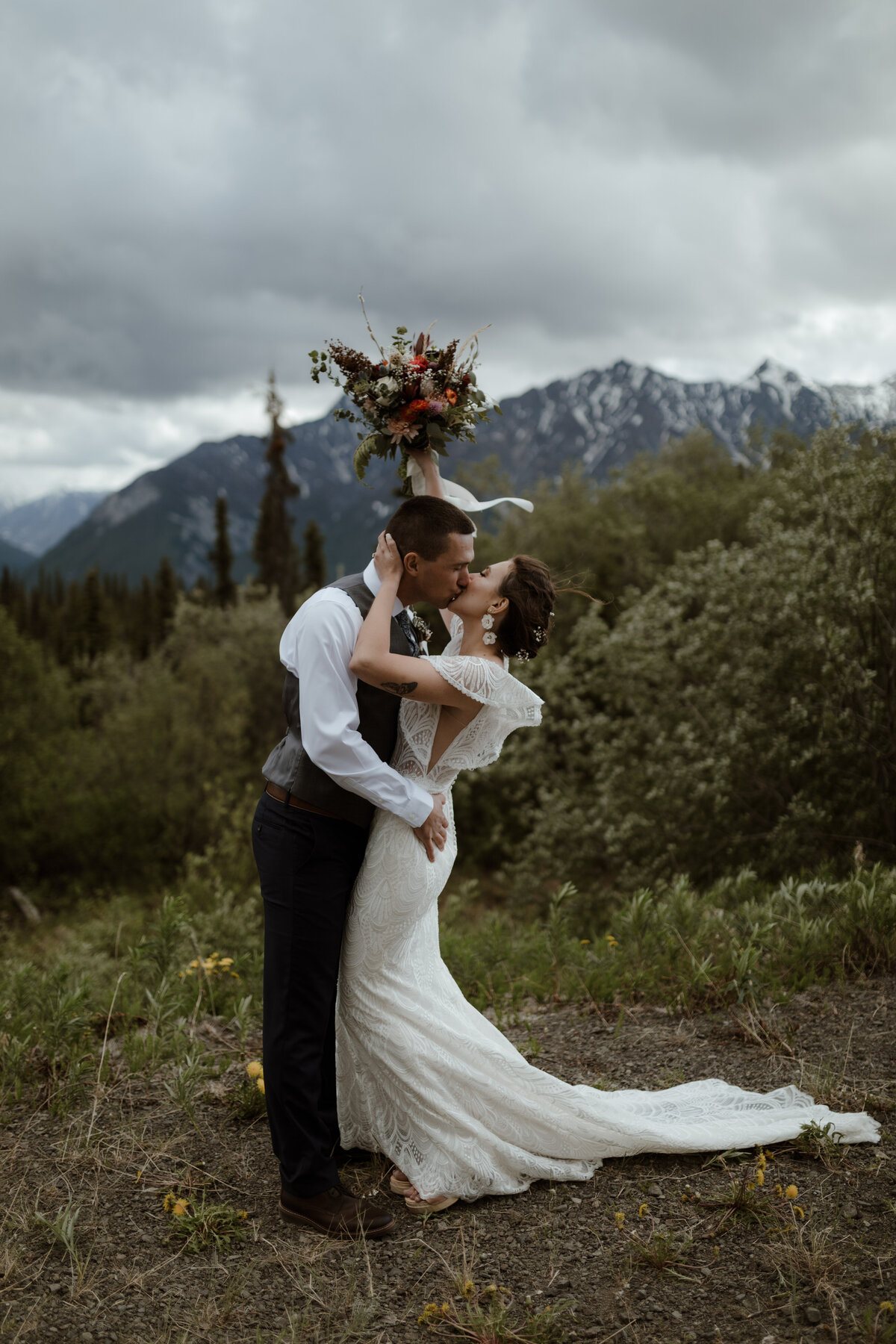 Bride and groom kissing