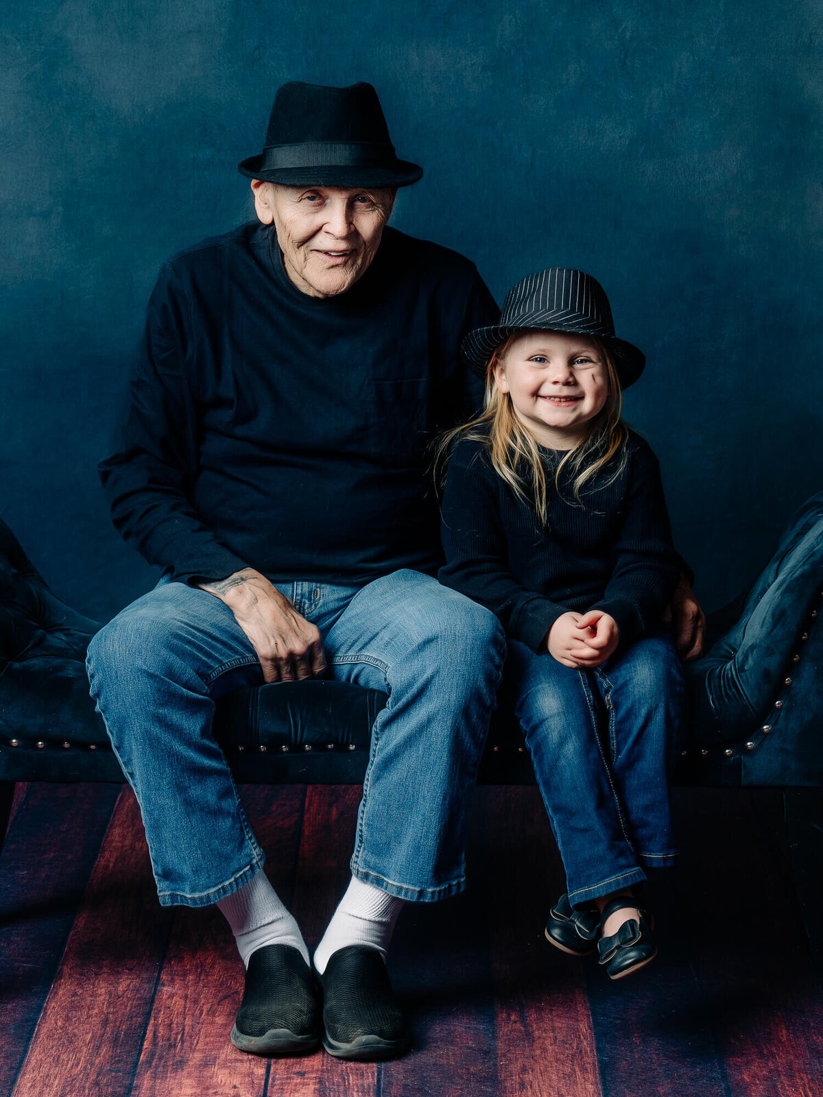 Girl smiles with grandfather in Prescott family photos