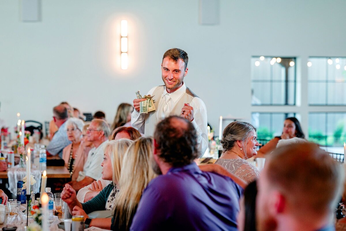 groom-smiling-reception