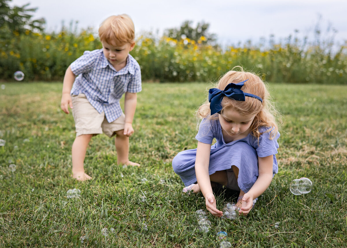 Children Playing with Bubbles