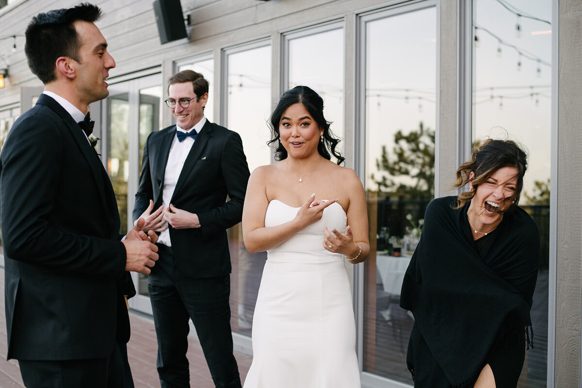 Candid wedding portrait of a couple in downtown Denver, taken by a documentary wedding photographer.