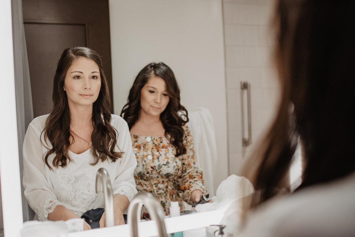 Photographers Jackson Hole capture women getting ready in mirror