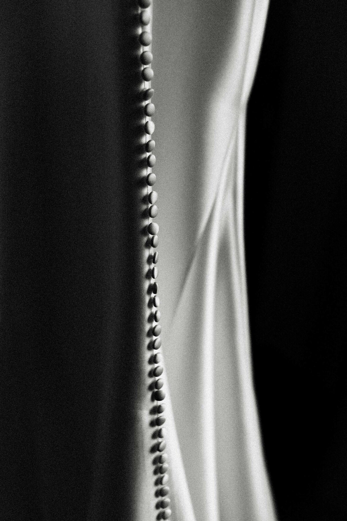wedding-gown-artistic-black-and-white-photography-silk-buttons