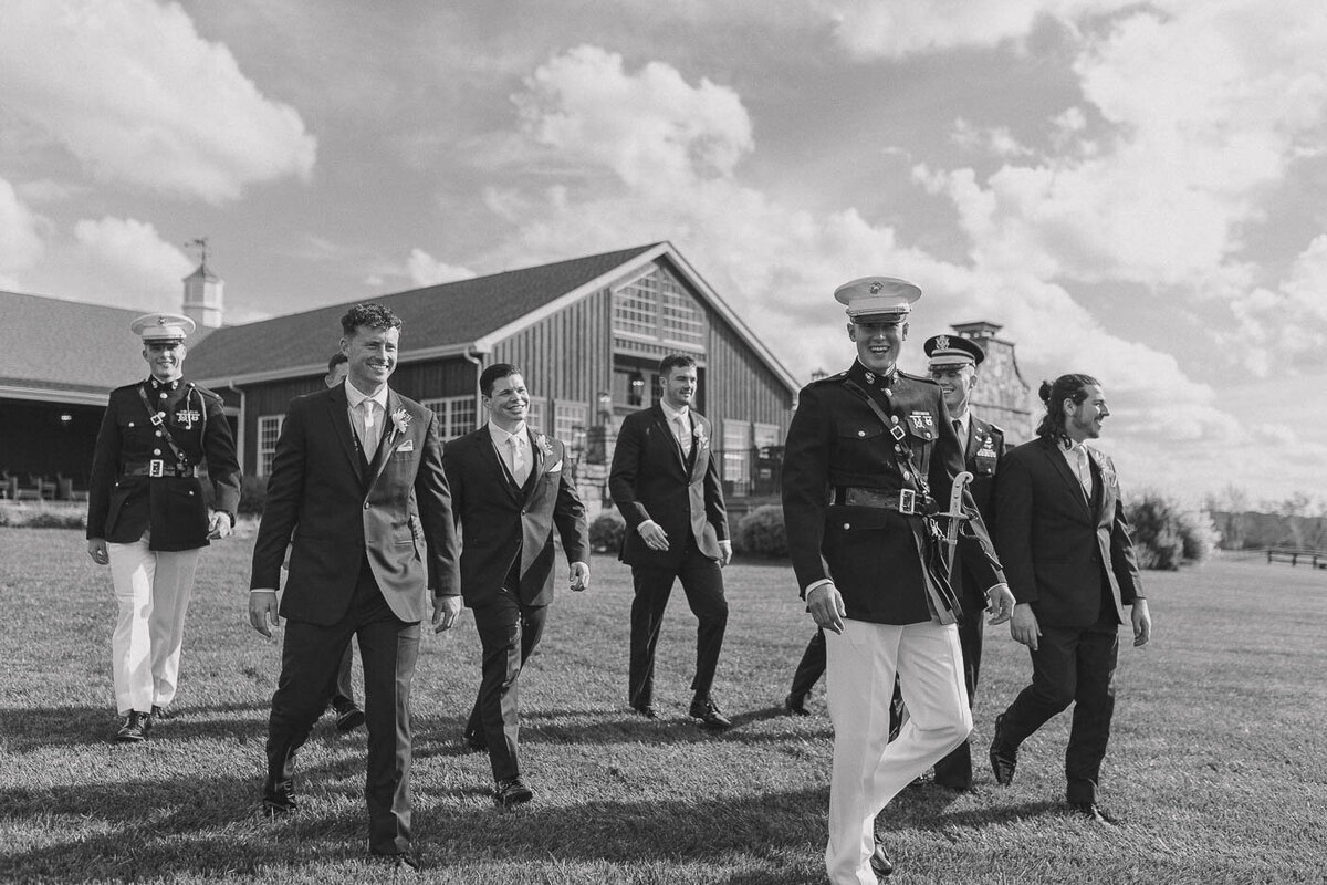 Groomsmen in military uniform walking together