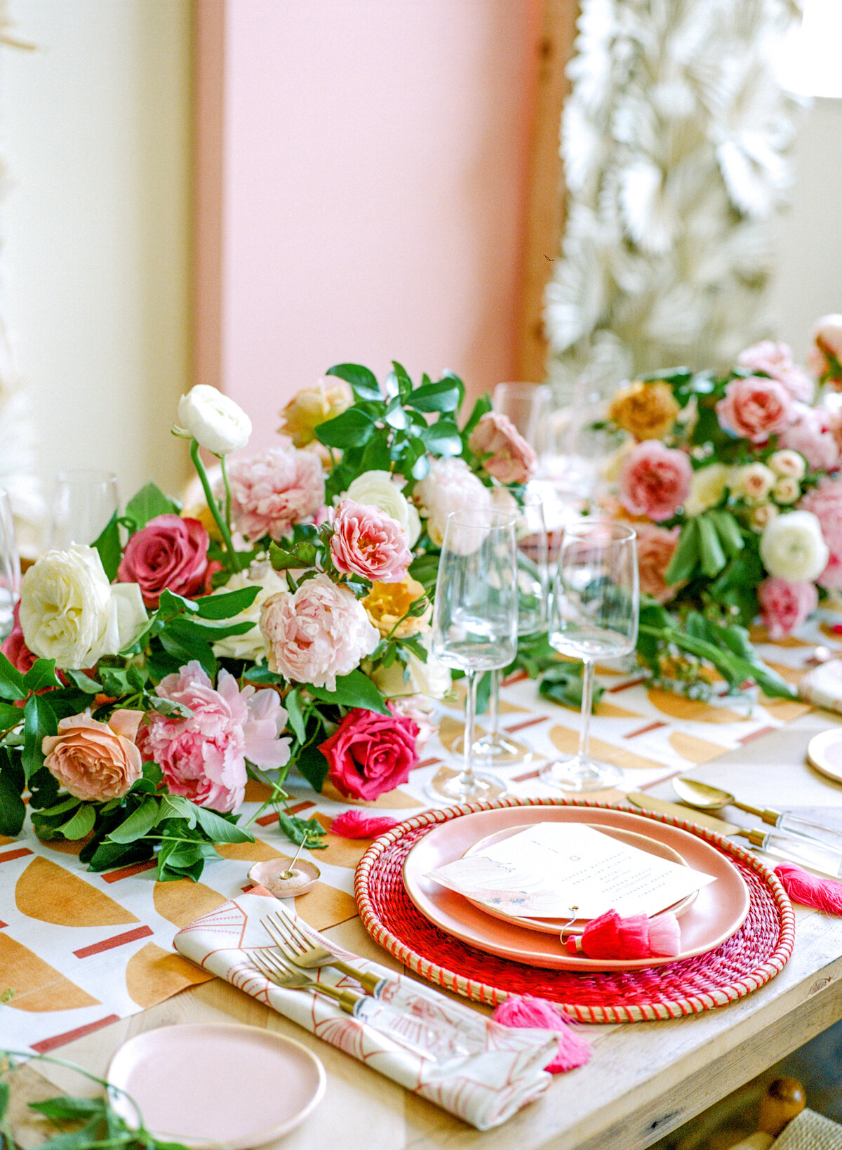 image of pink table setting with pink and white florals