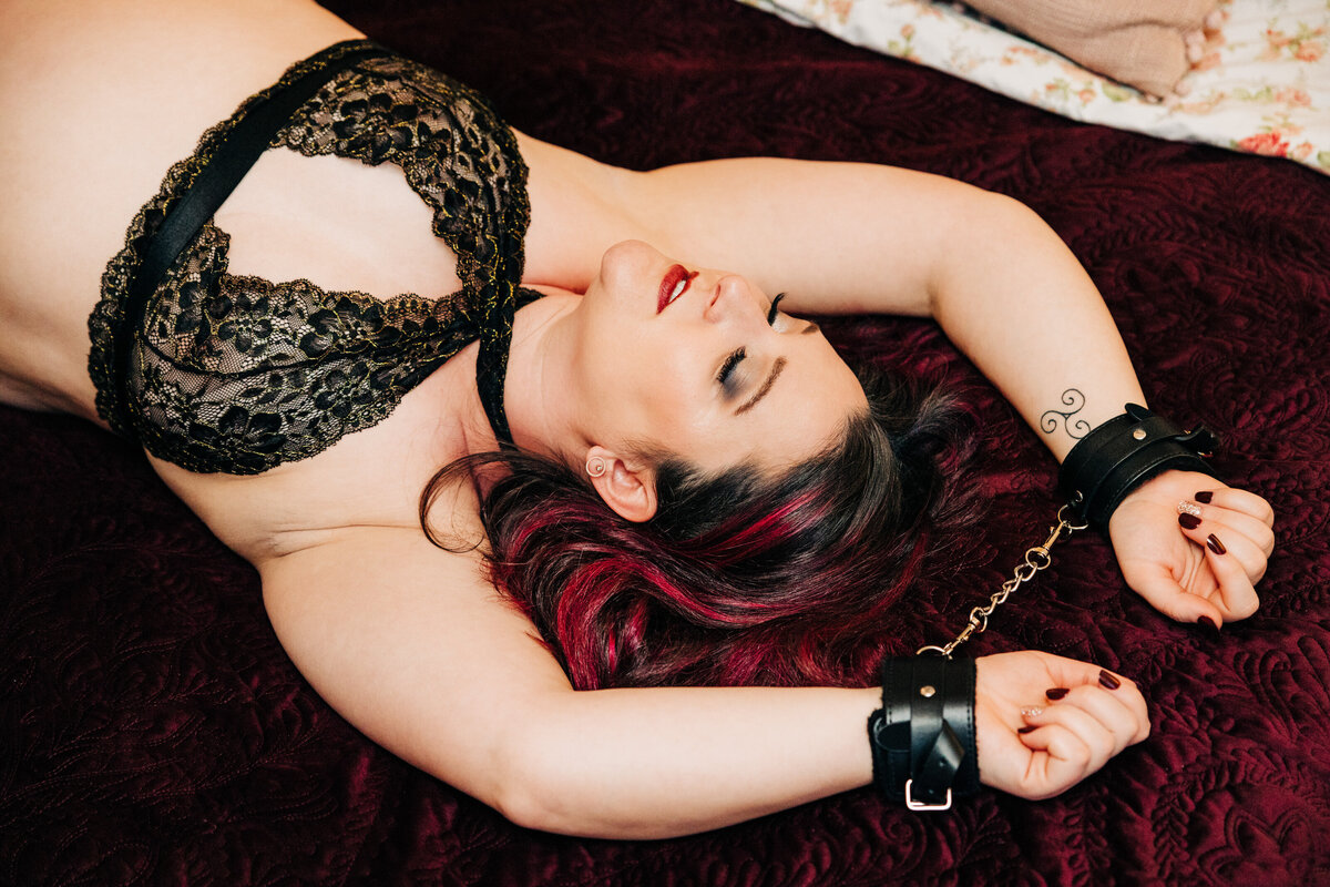 Boudoir photo Missoula woman black lingerie and soft handcuffs