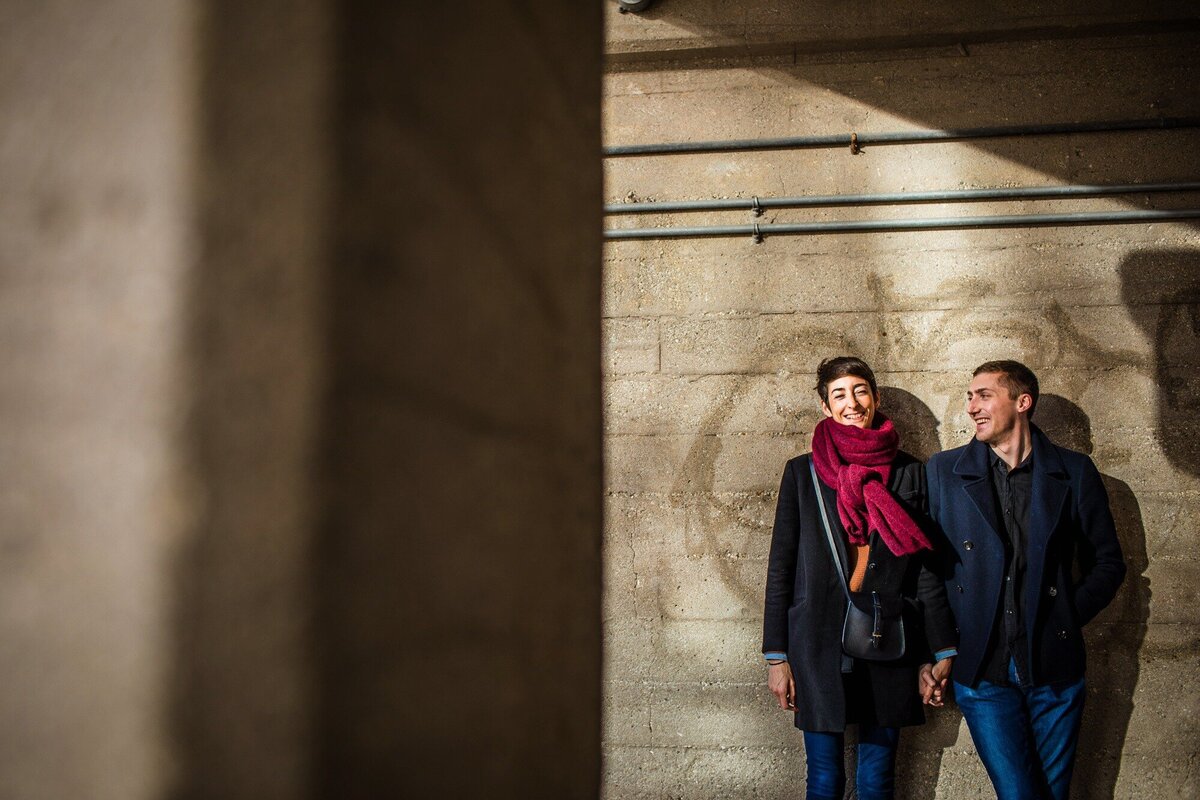 A couple holds hands during a Wicker Park engagement session.