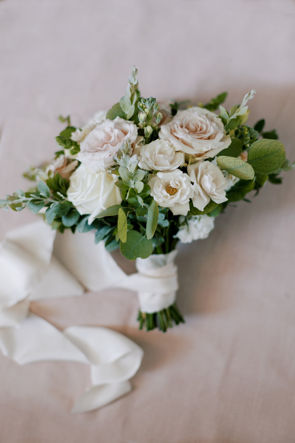 Bridal bouquet with silk white ribbon