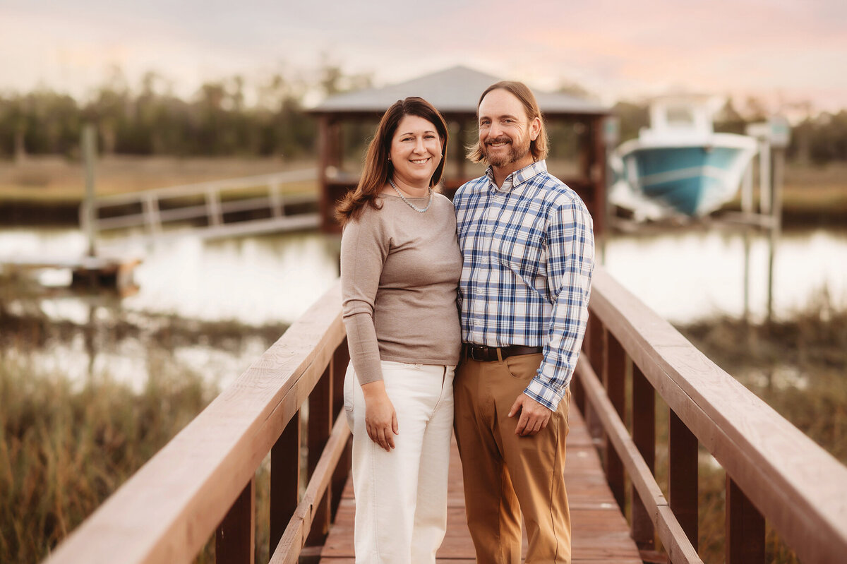 Couple embraces during Family Photos in Charleston, South Carolina.