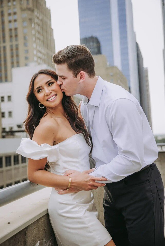 A modern Houston bride receiving luxurious makeup application by an expert Houston makeup artist.