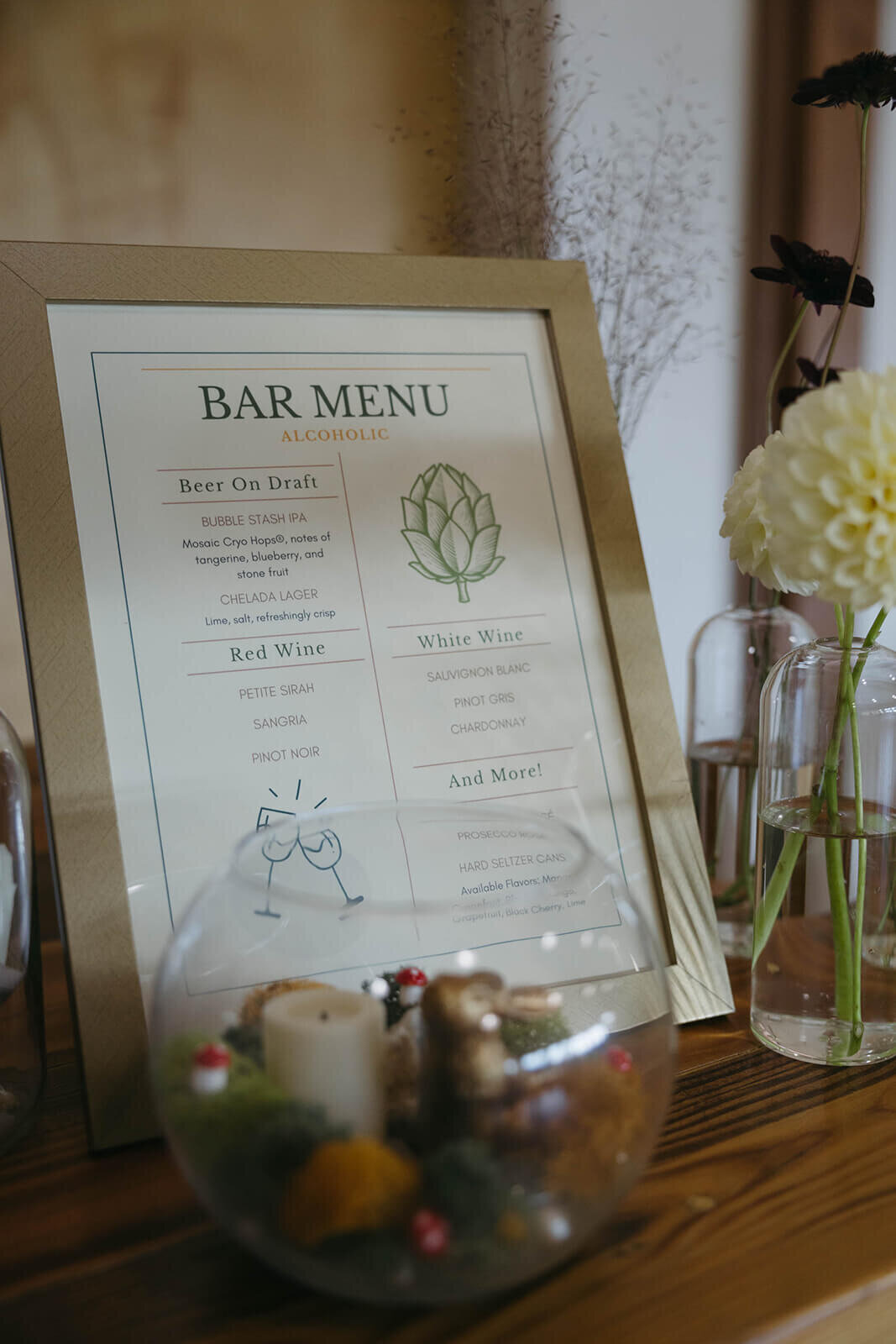 A framed bar menu at a magical themed wedding in Oregon.