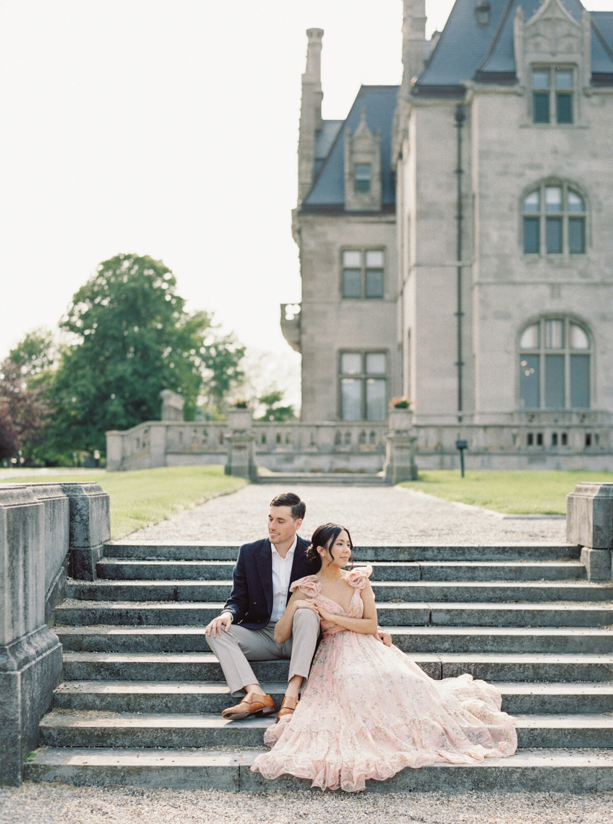 Engagement photos on mansion stairs