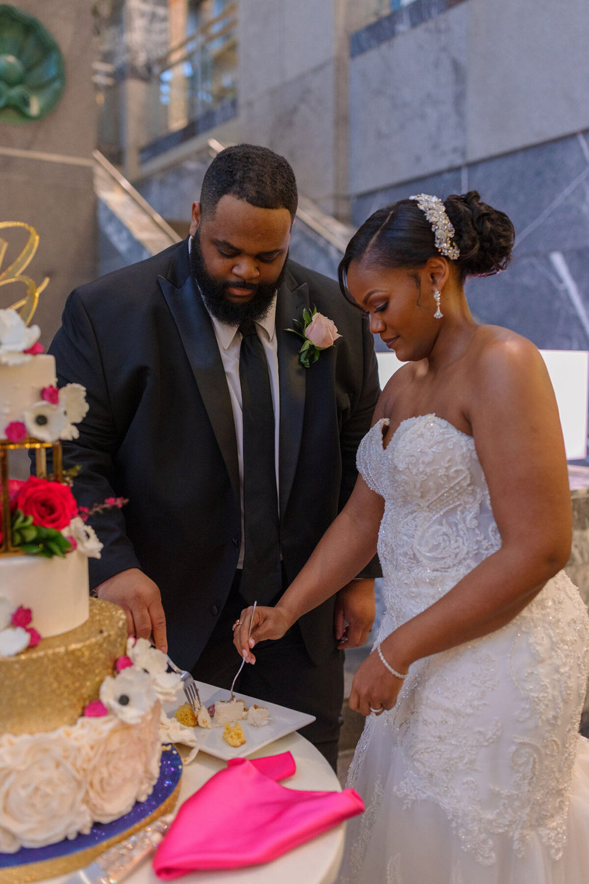 chicago event design bride and groom cutting cake