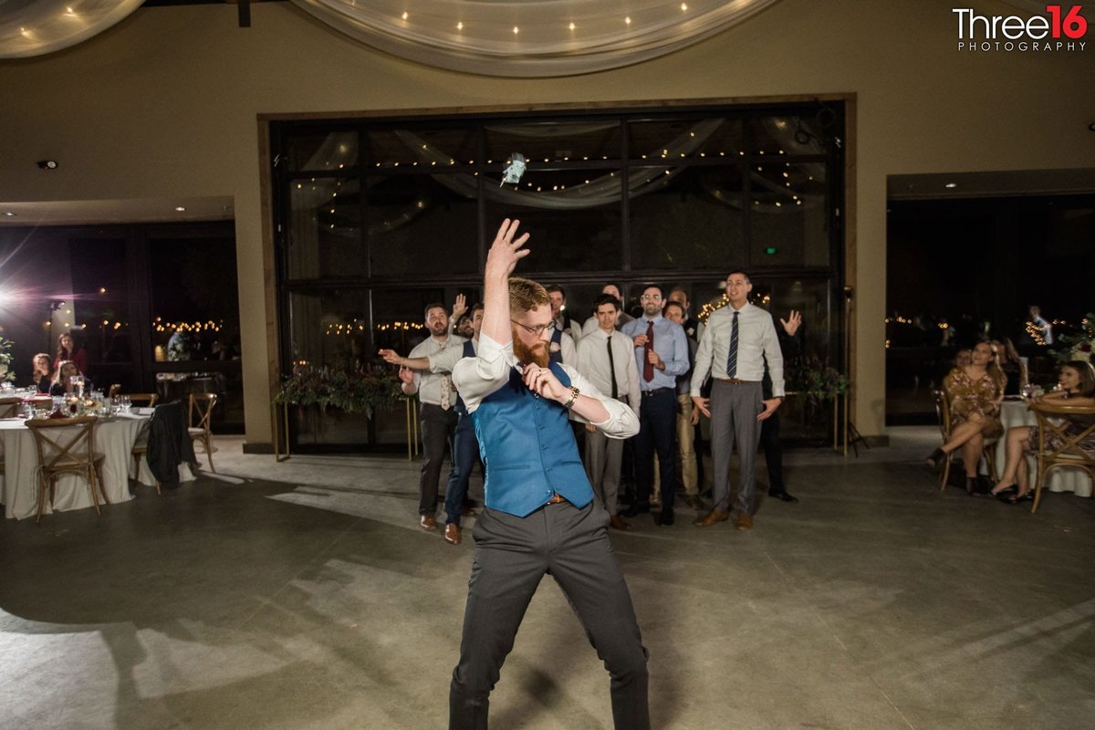 Groom dancing solo