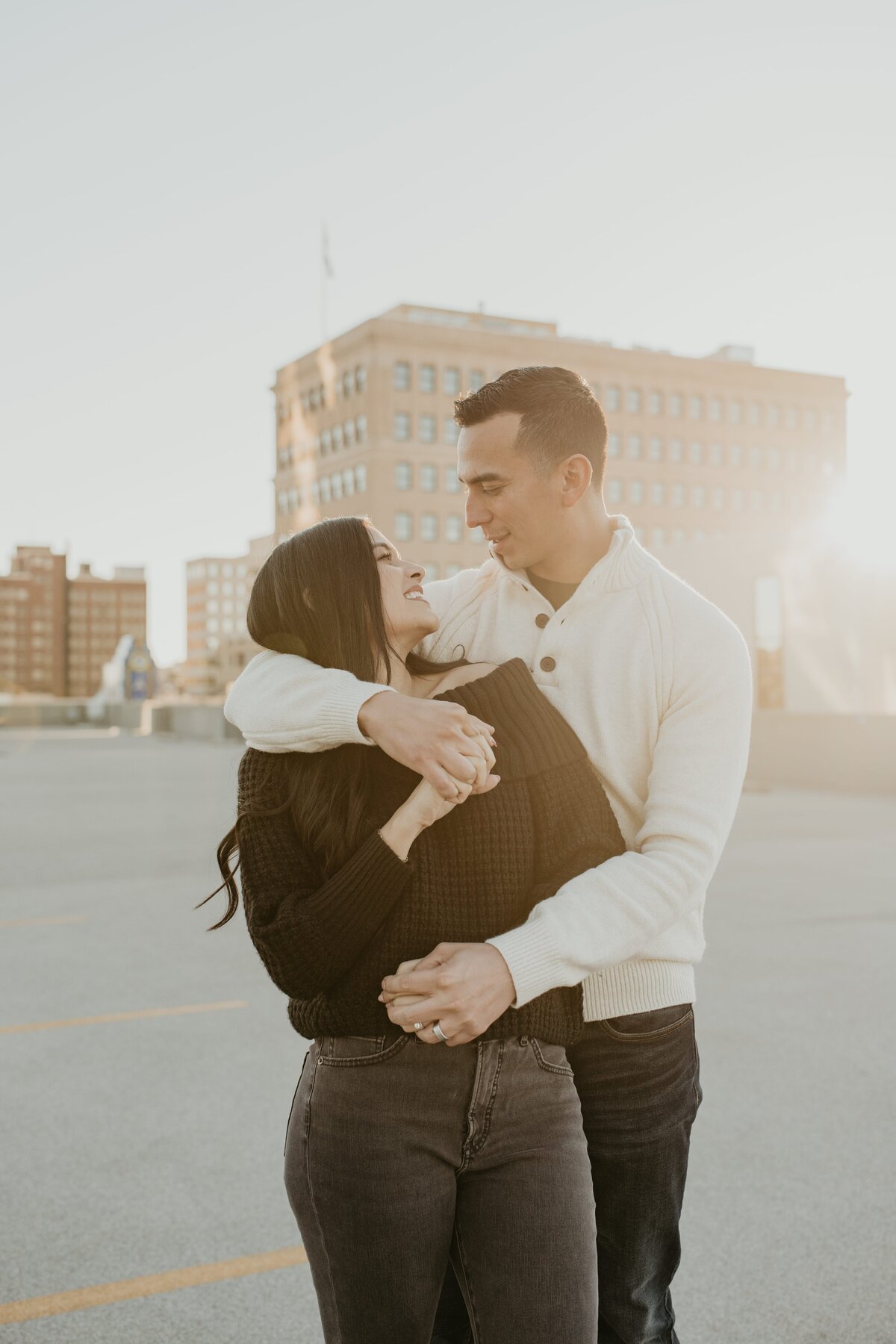 couple embracing on rooftop in amarillo texas, , Emily wheeler photography