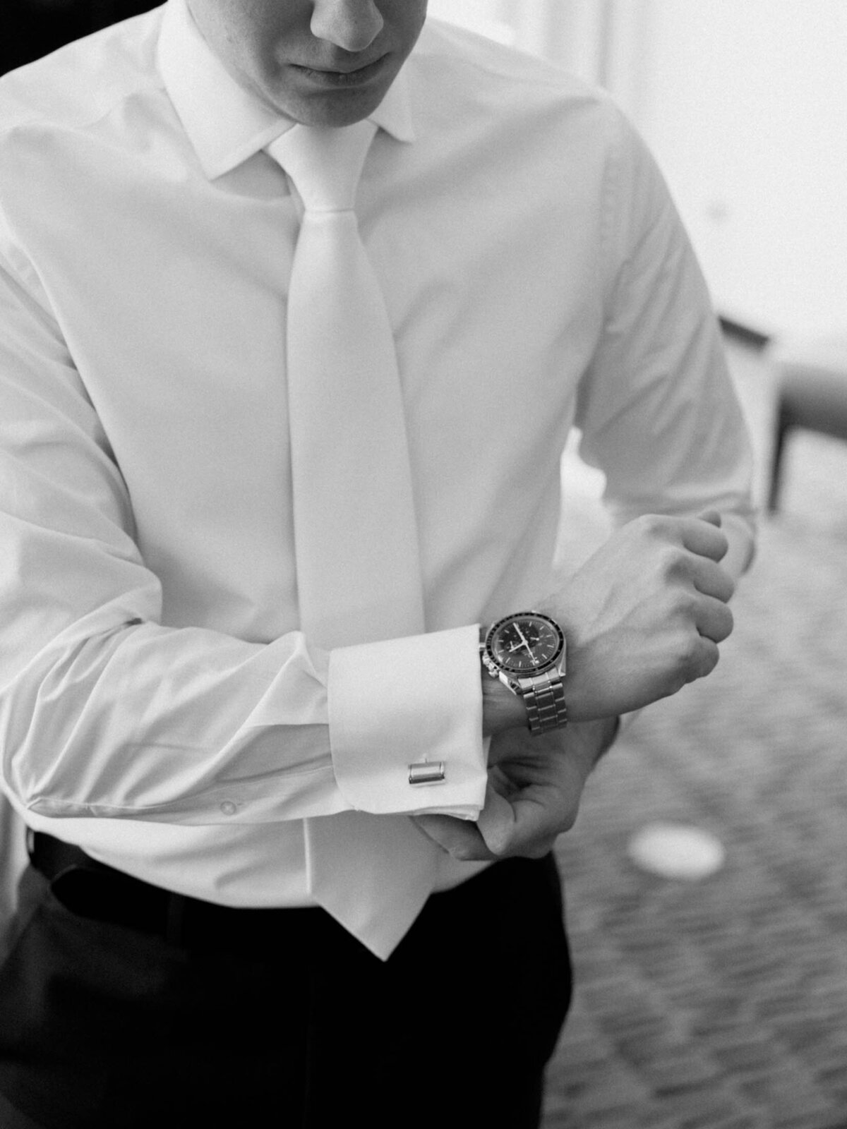 Groom getting ready at private estate wedding